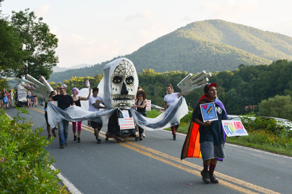 La Llorona float approaches with the mountain in the background