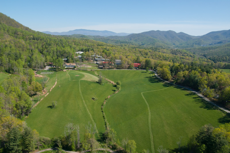 An aerial view of the campus from over the meadow.