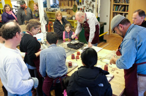 visitors learning to cast pewter