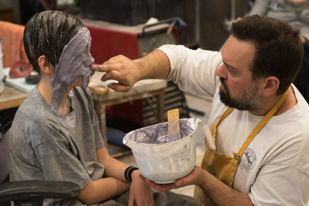 Penland resident artist Dean Allison making a mold of James Haley's head