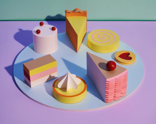 Reina Takahashi, Cakes (after Wayne Thiebaud), paper, wood, overall dimension 4 x 16 x 16 inches; cake slices approximately 4 x 6 x 2 inches