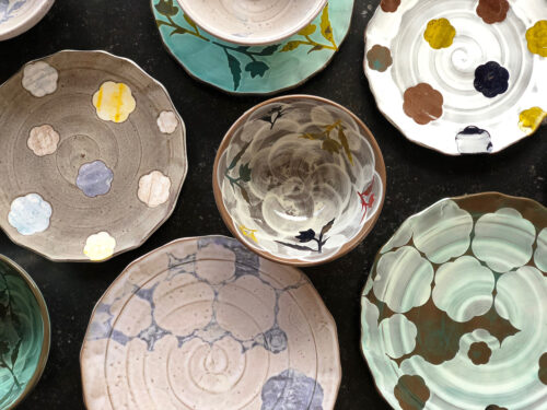 Sanam Emami, Tableware, stoneware, chocolate stoneware, slips, stencils, oxidation, largest plate: 10 inches