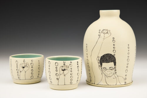 Michelle Roxana Ettrick, We Can, white stoneware, bottle: 7 x 5 x 5 inches, cups: 2 x 2 x 2 inches, courtesy of Charlie Cummings Gallery