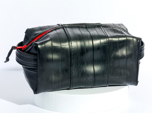Topaz M. Terry, BicycleTrash Dopp Kit, stitched bicycle inner tube, billboard vinyl, molded plastic zipper, 7-1/2 x 4 x 3-1/2 inches